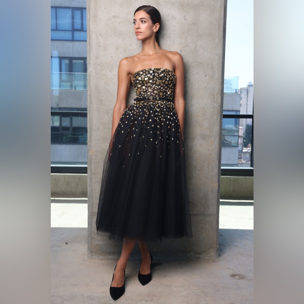 Hand embellished crystal tulle midi dress.